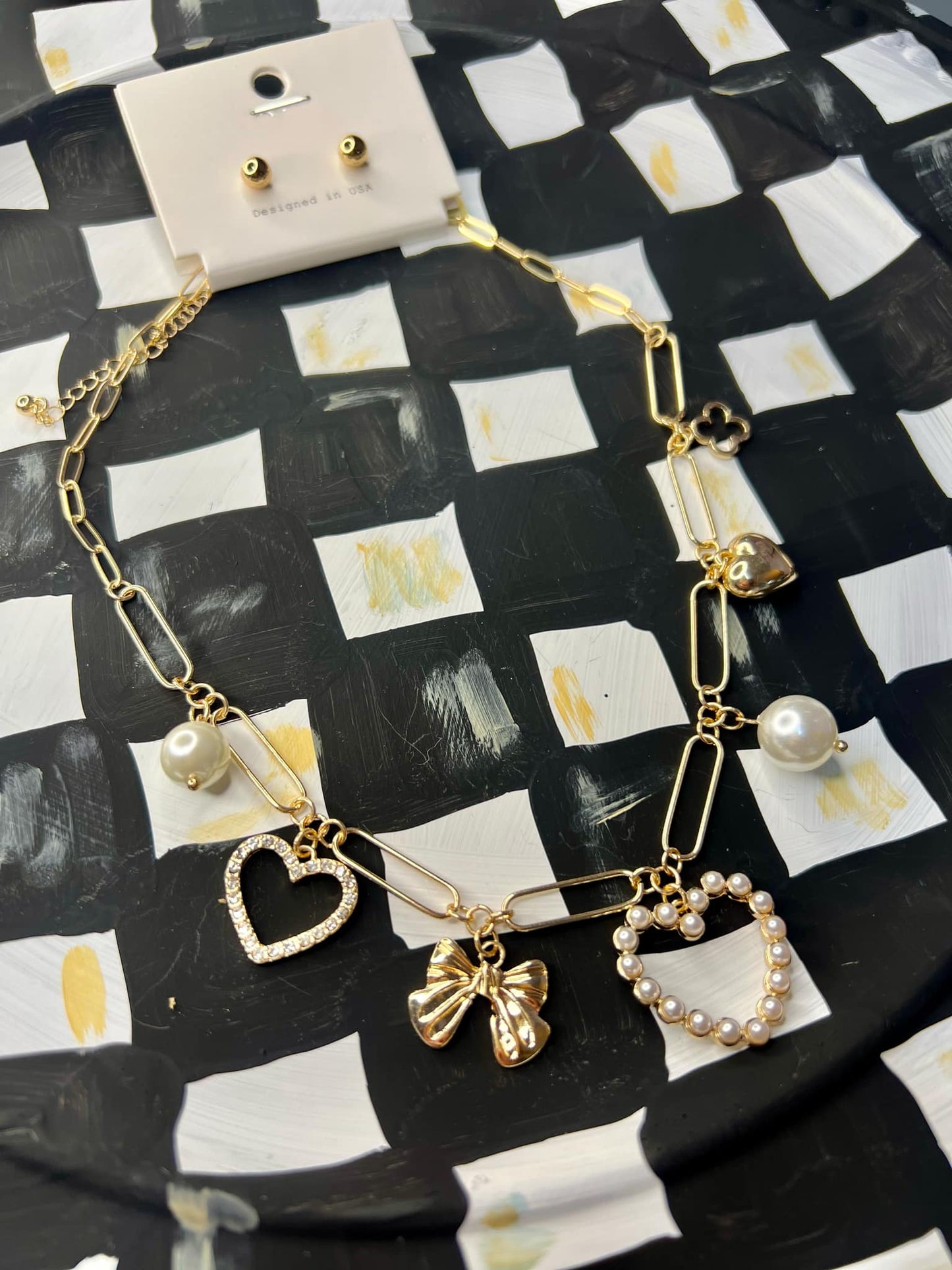 Pearl Bow Gold toned Charm Necklace