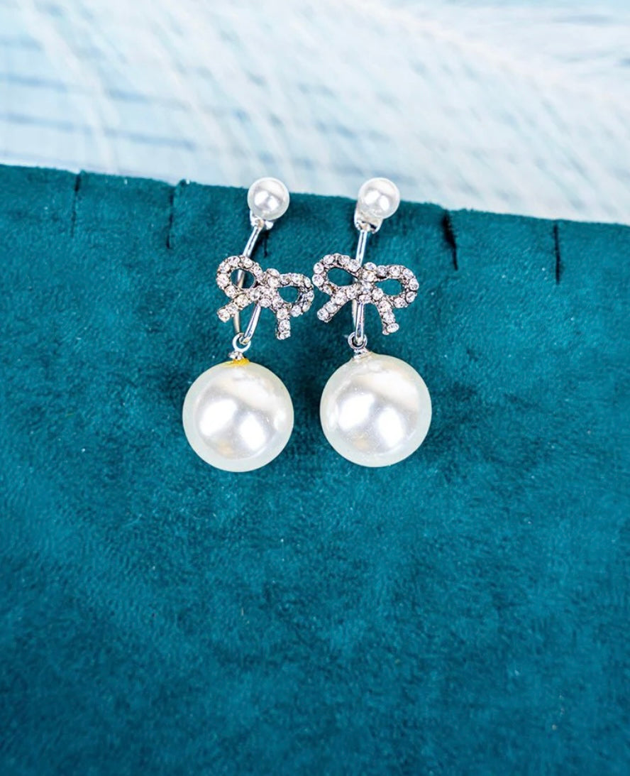 Pearl Bow Jacket Earrings
