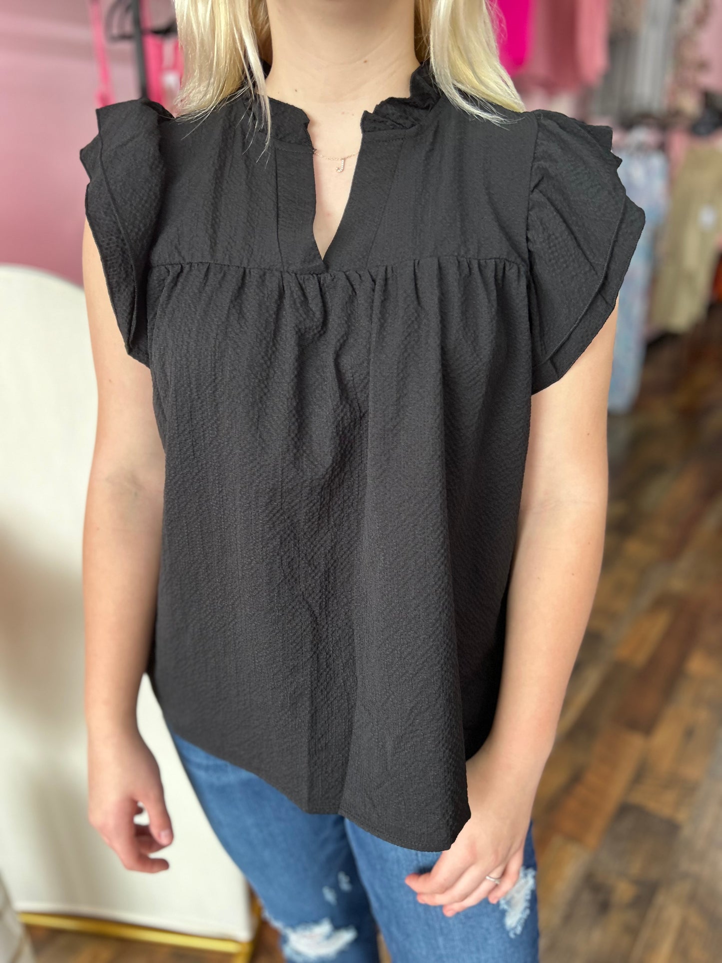 Black ruffle sleeve blouse