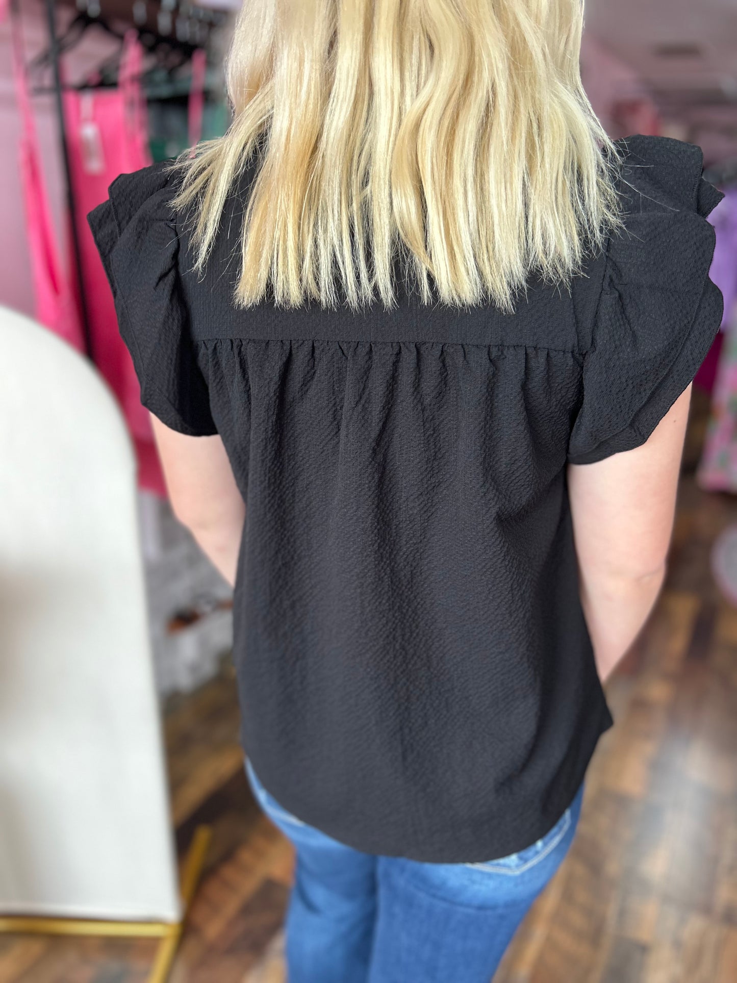 Black ruffle sleeve blouse
